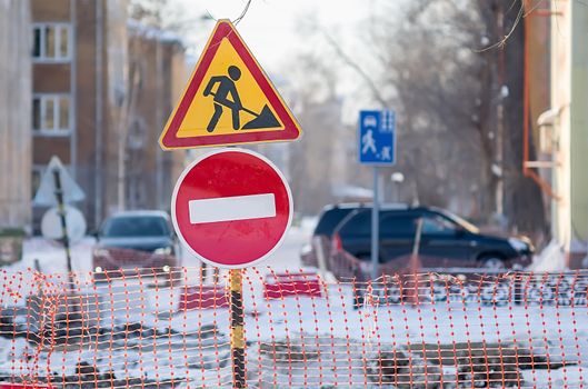 traffic stop sign, detour, repair, reconstruction of the road in the city