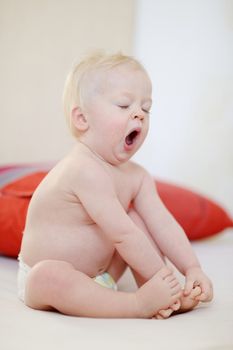 Adorable yawning toddler girl