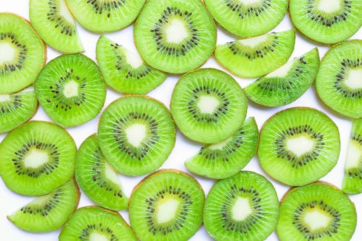Ripe kiwi fruit slices isolated on white