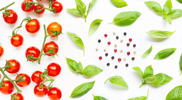 Fresh  cherry tomatoes with basil leaves and different type of p
