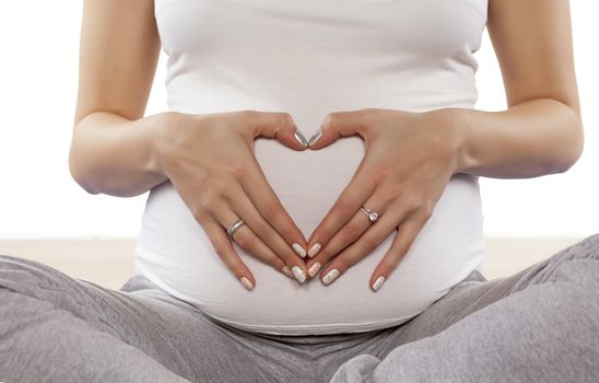 pregnant woman in sitting position