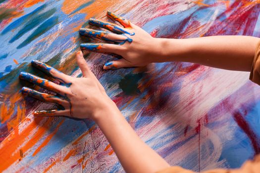 Hands of artist with paint