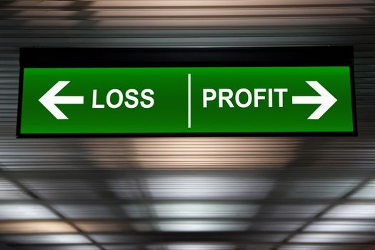 Financial concept. Loss and Profit Arrows sign, indicated stock market activity.