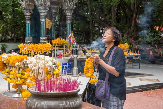 Thai buddhism pray for benefaction worship