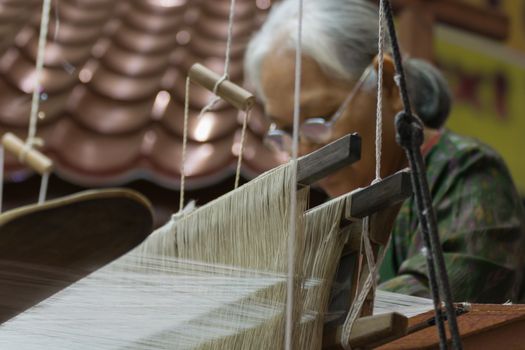 Weave of making Thai Silk