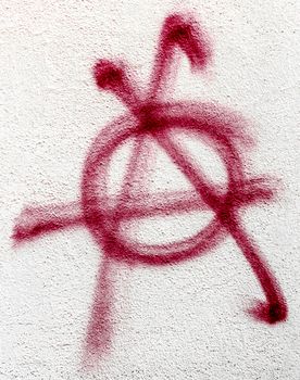 Anarchy symbol painted on wall