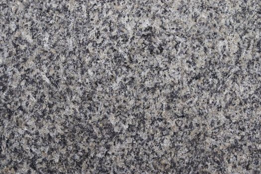 Granite stone texture in a detailed close up view in a high resolution.