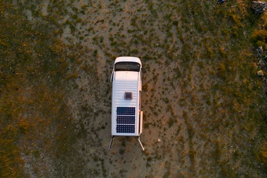 Camper van motorhome with solar panels drone aerial top above view in Arouca Geopark, in Portugal