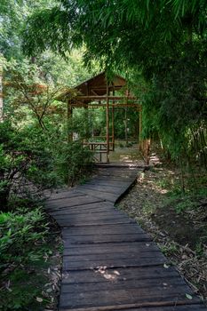 Ancient bamboo cabin and the path, Suzhou garden, in China.