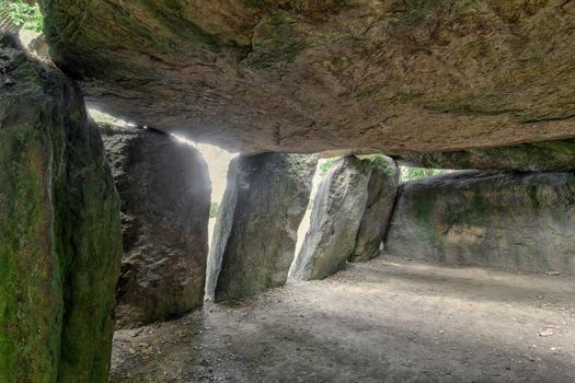 Inside a prehistoric burial chamber or Dolmen La Roche aux Fees
