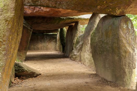 Inside a prehistoric burial chamber or Dolmen La Roche aux Fees