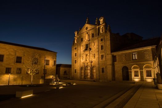 Night view of square in the front of Santa Teresa Convent in Avila, Spain