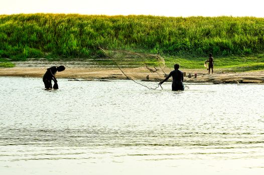 Fishermen Life along beautiful sunset the Mekong River