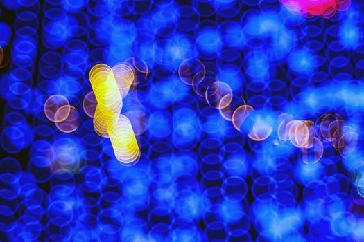 Festive abstract background with booble bokeh defocused lights.