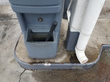 black squeegee and downspout