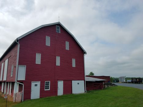 large red barn with no trespassing signs