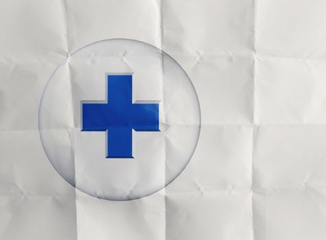 First aid medical sign on crumpled paper 