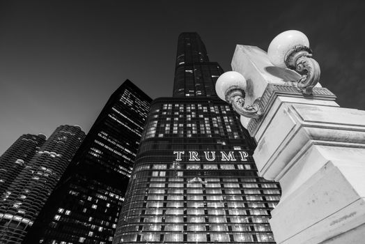 Chicago - March 2017, IL, USA: The Trump Tower skyscraper at night. High rise building of one of the most famous skyscrapers in the city of Chicago, black and white photo