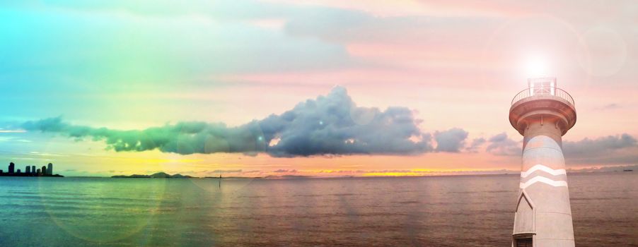 lighthouse ebb tide sunset on horizon in sea panorama
