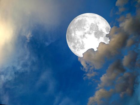 full moon shine on blue sky and back cloud