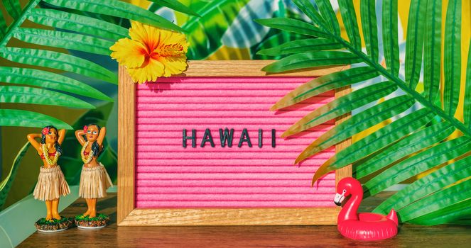 Hawaii travel retro sign with hula dancing dolls pink flamingo toy float and plastic palm tree leaves for kitsch board. Hawaiian vacation summer holidays background