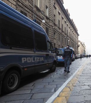 police van and officer in Turin