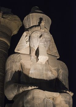 Statue of Ramses II at Luxor Temple at night