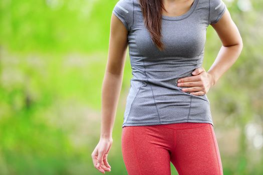 Side stitch - woman runner side cramps