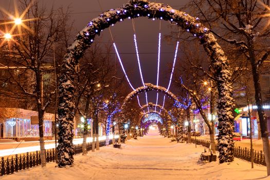 Walk of the city at night in winter