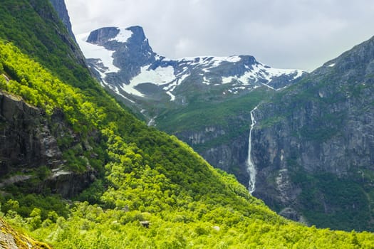 Falls in mountains of Norway in rainy weather