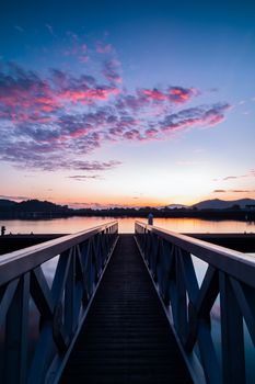 Structure of the jetty leading to the beautiful sunrise glow