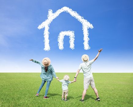 happy  family watching the sky with home and house symbol concept