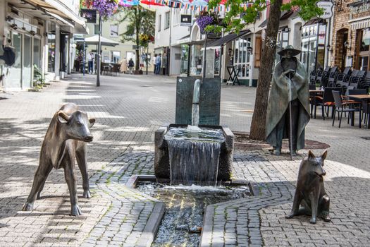 Siegen shopping street with watercourse and bronze animals