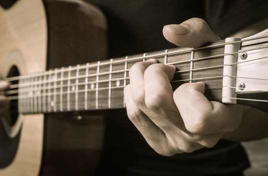 Guitar Player Hand in C Major Chord on Acoustic Guitar in Side V