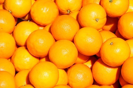 Top view of tasty oranges freshly collected background