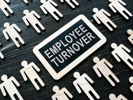 Plate with words Employee Turnover and figures.