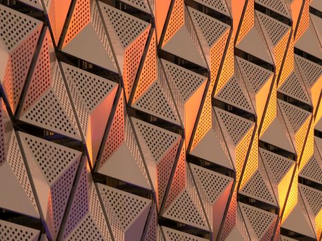 metallic geometric cladding or panels in copper and gold colors