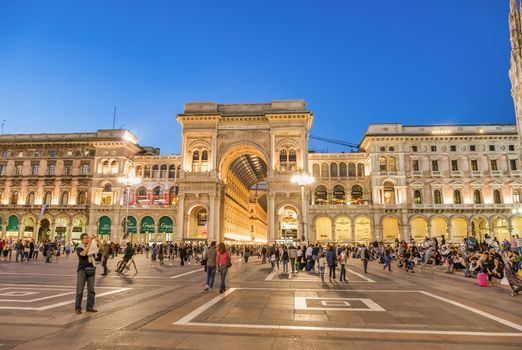 MILAN, ITALY - SEPTEMBER 2015: Tourists and locals enjoy night l
