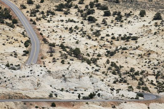 Road through barren desert elevated view