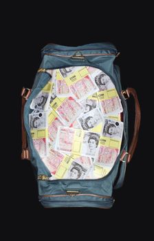 Bag full of sealed Pound banknotes view from above