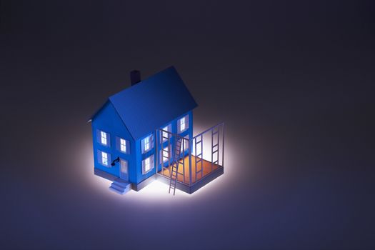 Illuminated model of house