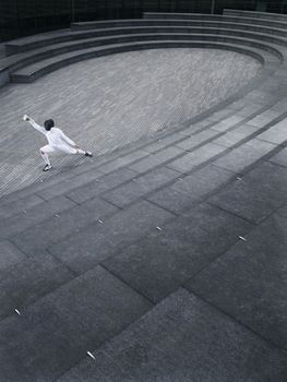 Fencer practising in the Scoop amphitheatre London England elevated view
