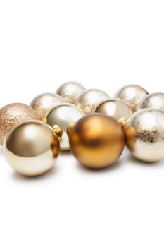Group of Christmas baubles over white background