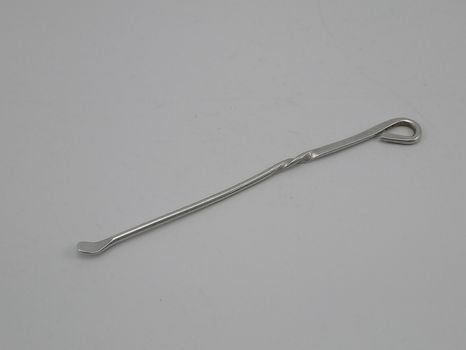 Small steel stick with hole and scooper 
