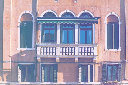 Italian culture on Venetian facades.