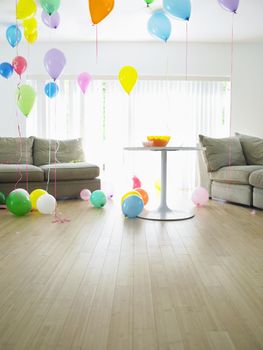Living room full of balloons