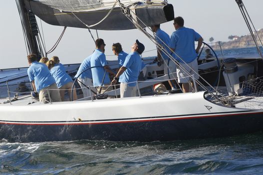 Photo of Sailing team on sailboat