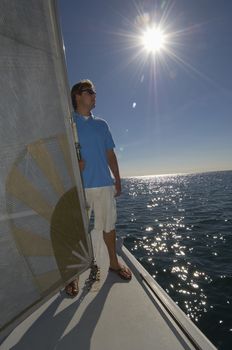 Sailor on yacht in ocean