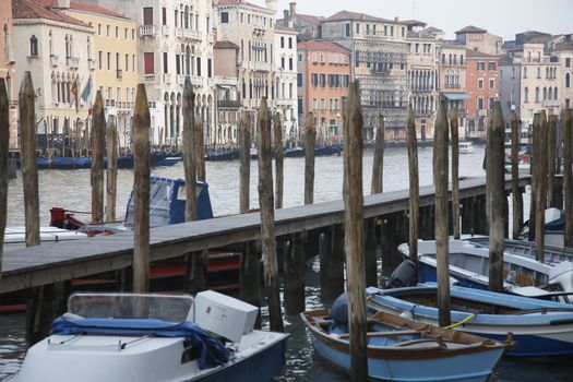 Italy Venice jetty with boats