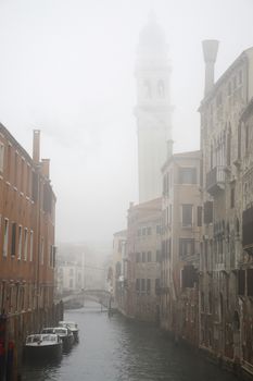 Italy Venice canal in fog